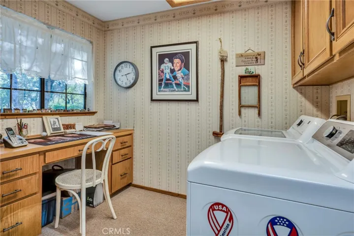 Interior Laundry Room with Desk Area and Storage
