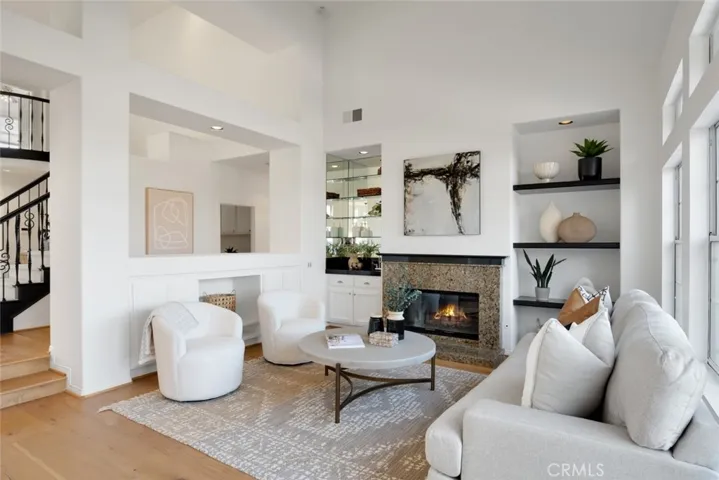 Family room with vaulted ceilings and fireplace
