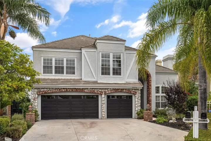 Roomy 3 car garage and large driveway