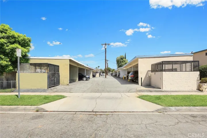 4 Parking carport spaces, one for each unit. (some area of picture has been photoshop)
