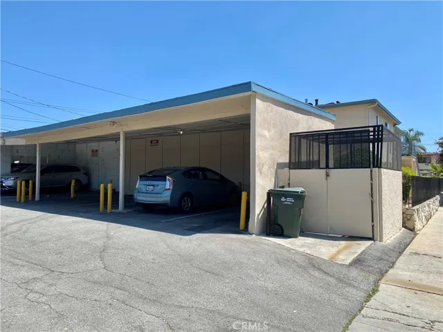 4 Parking carport spaces, one for each unit. (some area of picture has been photoshop)