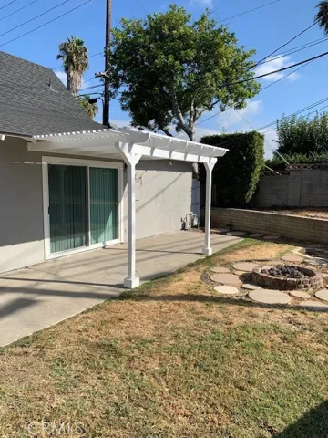 Backyard With Covered Patio & Firepit