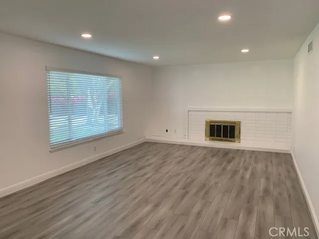Spacious Living Room With Cozy Fireplace