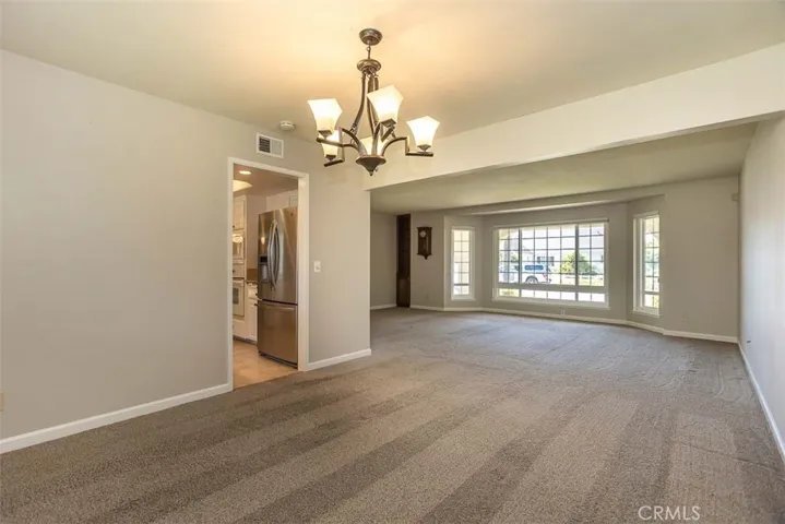 Dining opens to the living room and easy access to the kitchen.