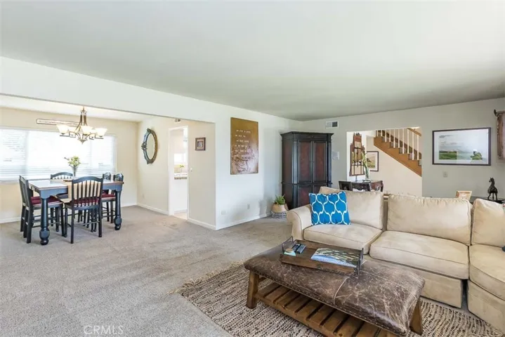 Open flow between the living and dining room, ideal for entertaining.
