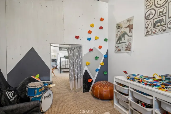 Secret fort with rock climbing wall! This room in bedroom #3 could also become an en-suite bath.