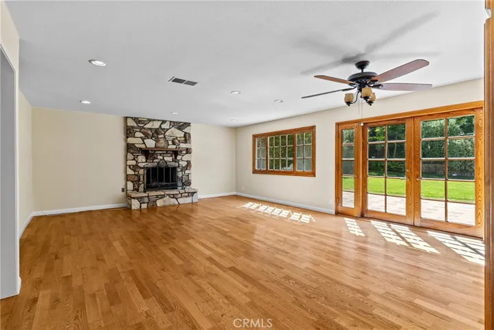 Second living space with dry bar and access to backyard