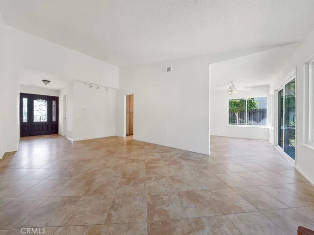 Entry way into your living room and kitchen area and access to outside.