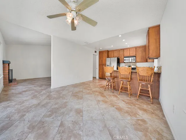 I want you to see how great it is to have your large kitchen and living room so close together