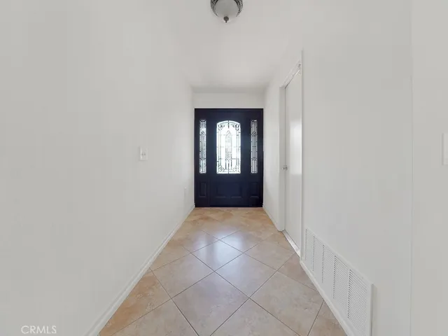 Beautiful long Entry into your home with access to your 3 car garage.