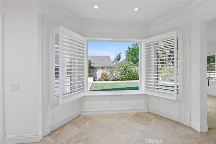 Breakfast nook with view of the big backyard.