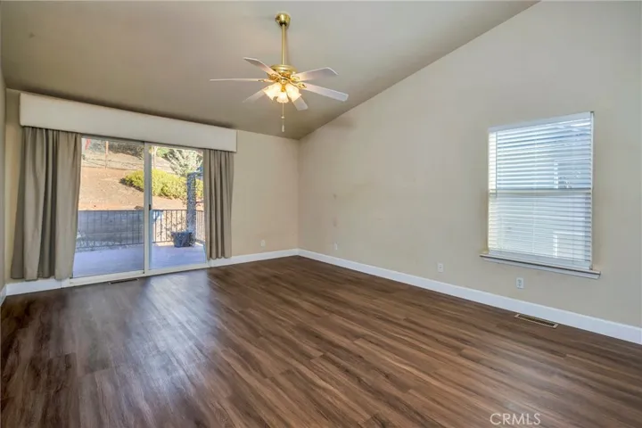 Primary bedroom (without furniture) Has a private backyard entrance.