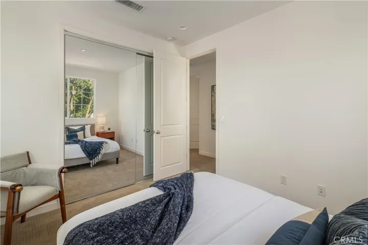 Bedroom 4 with mirrored closets