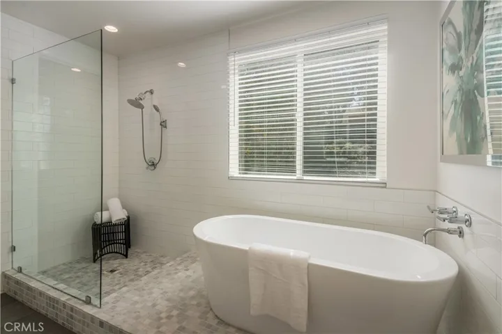 Primary bathroom with soaking tub & shower