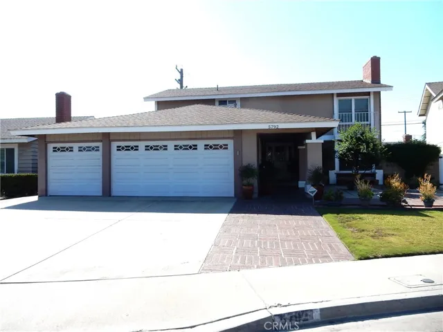 Street view of this 4 bedroom 3 bath home.