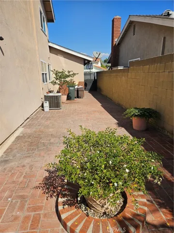 Side yard on the west side of the home.