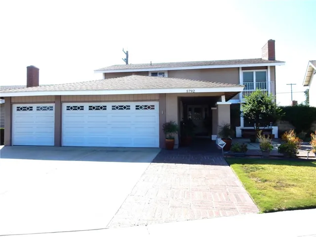 3 car garage with lots of outside parking.