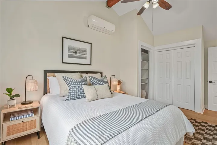 The downstairs 3rd bedroom feels volumnous with vaulted ceilings.