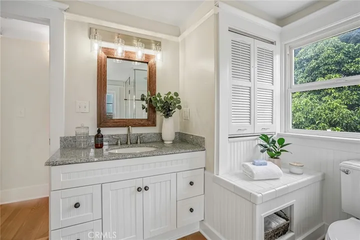 The primary bathroom is a private retreat away from it all.