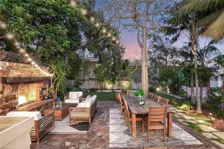 The back patio is turnkey for entertaining or a romantic evening in.