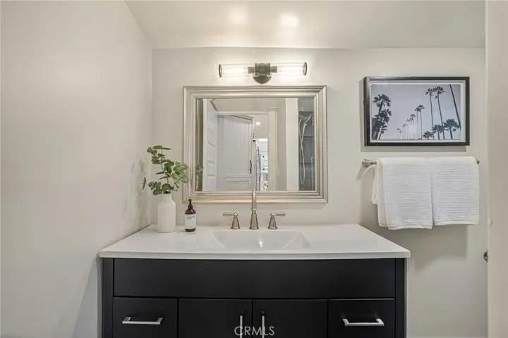 The downstairs bathroom with walk-in shower has the most amazing window & view... a surprise awaits.