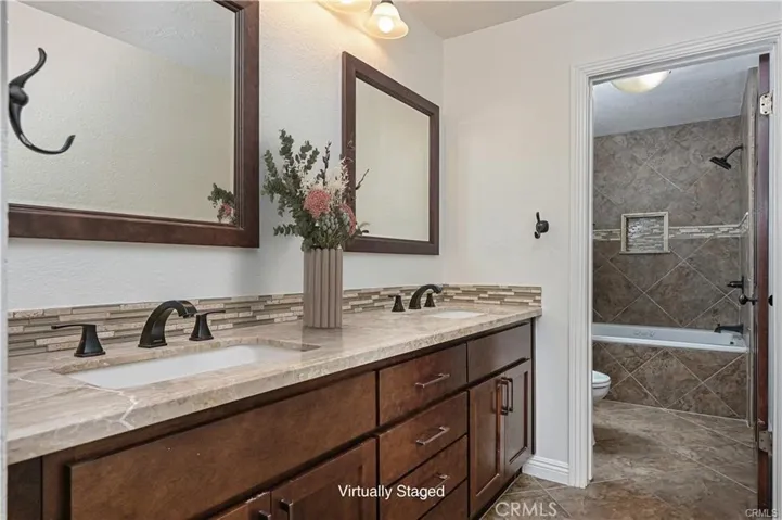 Primary Bathroom with dual sinks-staged