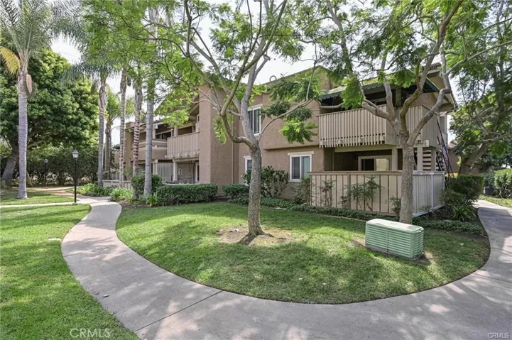 Grassy walkway to end unit