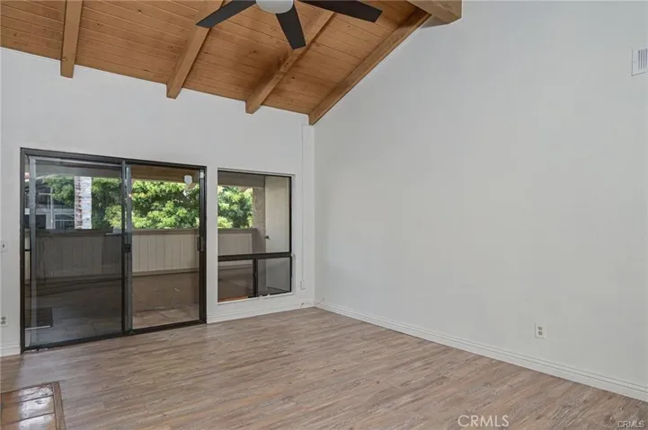 Vaulted Living Room with patio