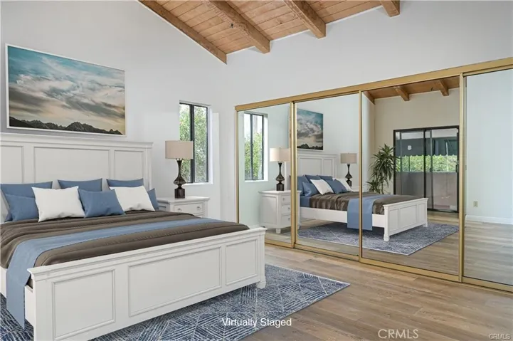 Primary Bedroom with Vaulted ceilings-staged
