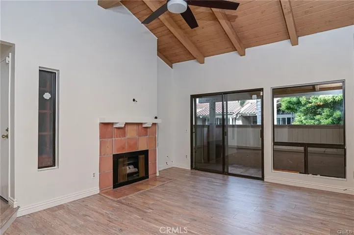 Vaulted Living room with Private Patio