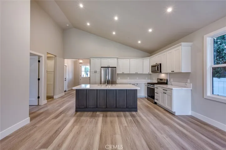 Older photo is representative of property, but updated photos showing new interior paint are coming