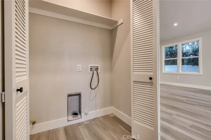 Older photo is representative of property, but updated photos showing new interior paint are coming