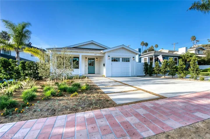 Older photo is representative of property, but updated photos showing mature landscaping coming