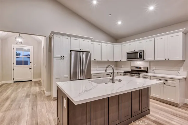 Older photo is representative of property, but updated photos showing new interior paint are coming