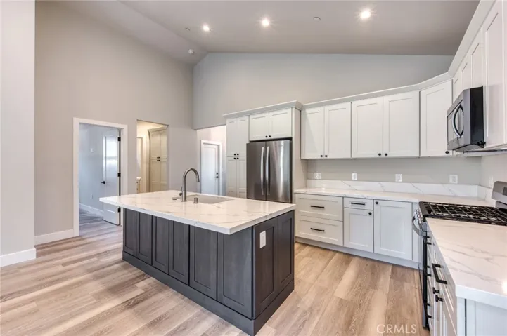 Older photo is representative of property, but updated photos showing new interior paint are coming