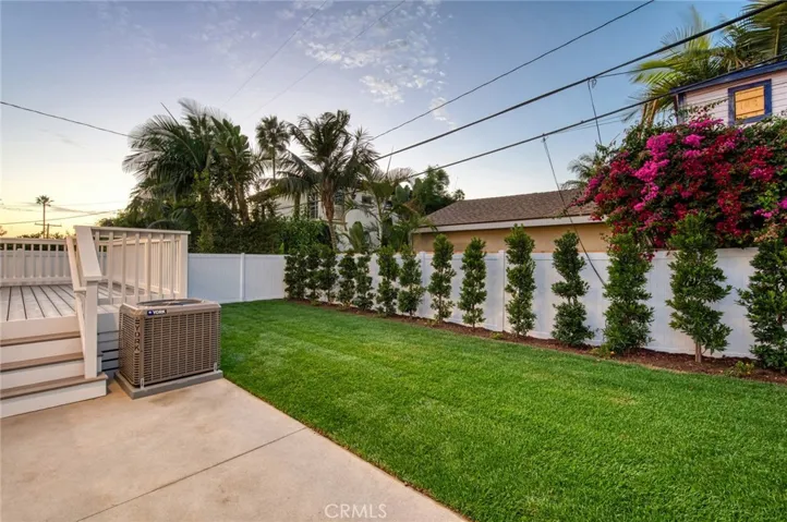 Older photo is representative of property, but updated photos showing mature landscaping coming