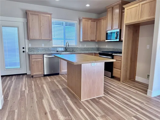 Open Kitchen with door to backyard