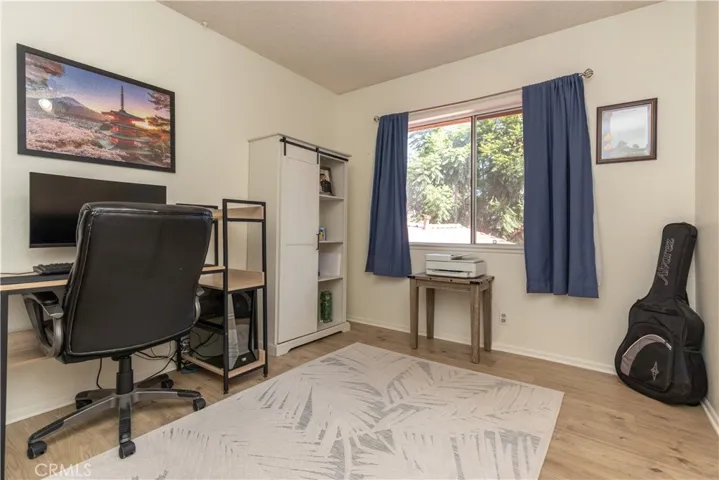 Third bedroom with a large window.
