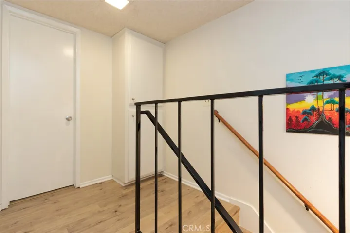 Upstairs landing with linen storage.