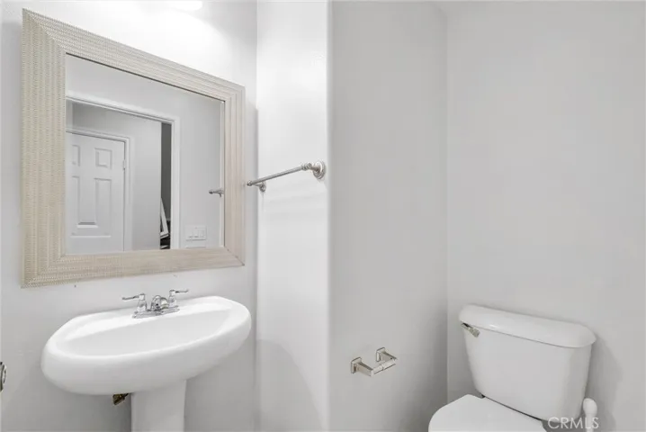 A Half bathroom on the main floor next to dining area