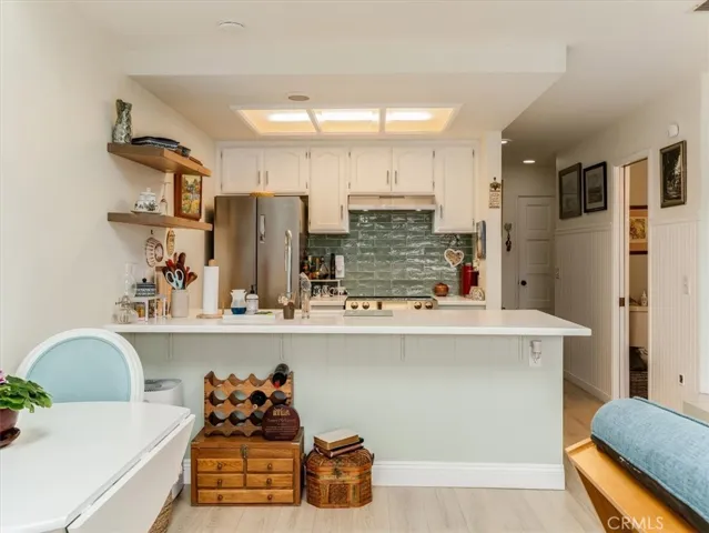 Other view of kitchen from back sliding door.