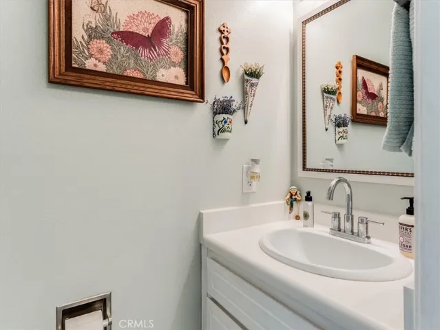 Half bathroom to left of kitchen.