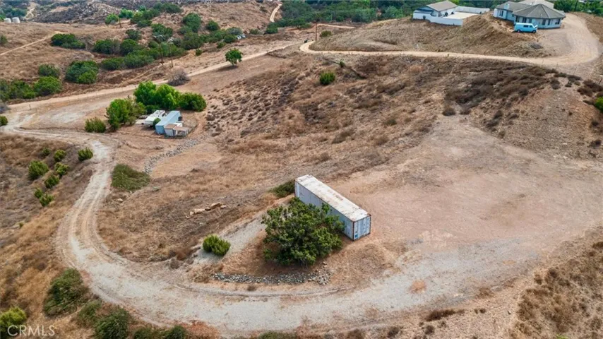 Extra Spacious Pad with plenty of room for 2 structures like the neighbor.