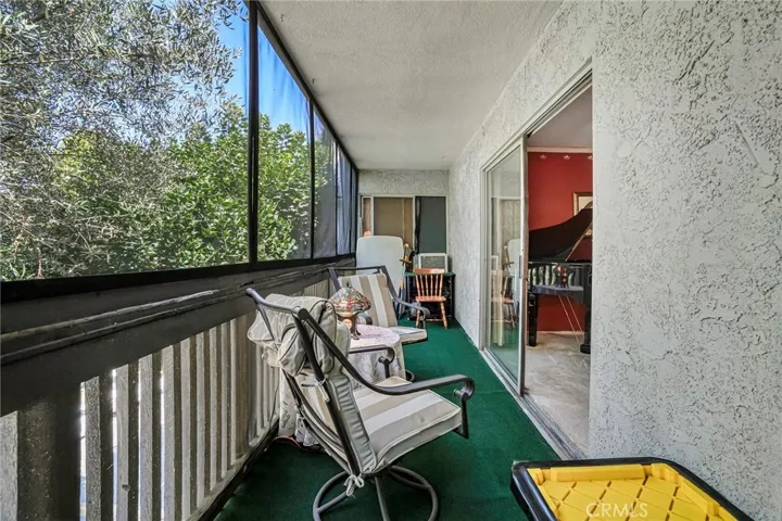 Balcony, 3 sliding doors, bedrooms & living rooms