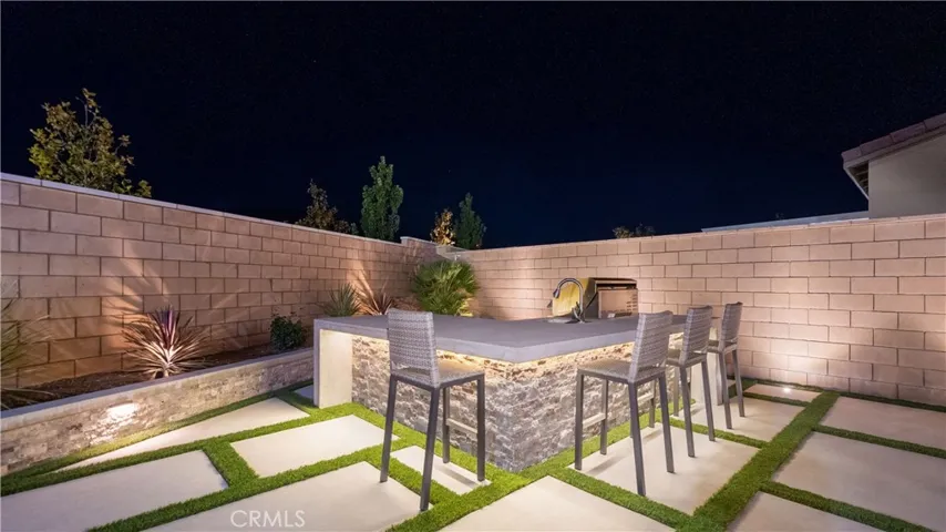 Landscaped with hardwired lighting