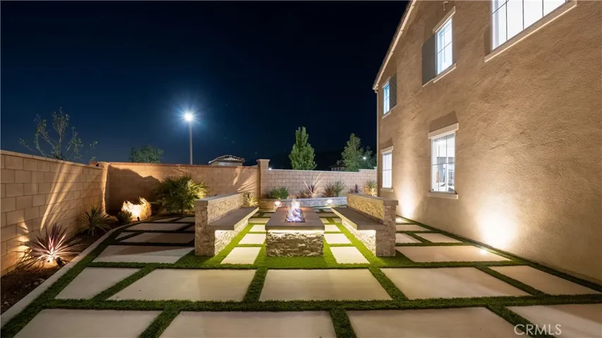 Landscaped with hardwired lighting