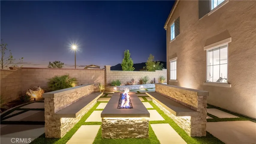 Landscaped with hardwired lighting