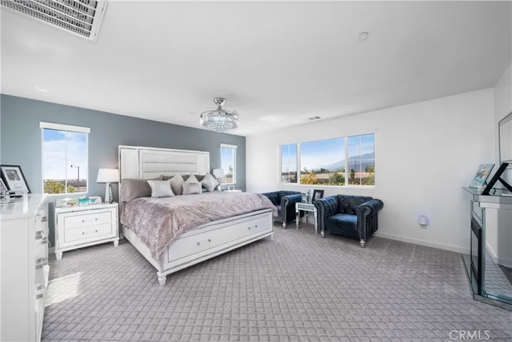 Primary bedroom w/ mountain view