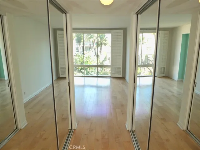 Primary bedroom with dual closets.