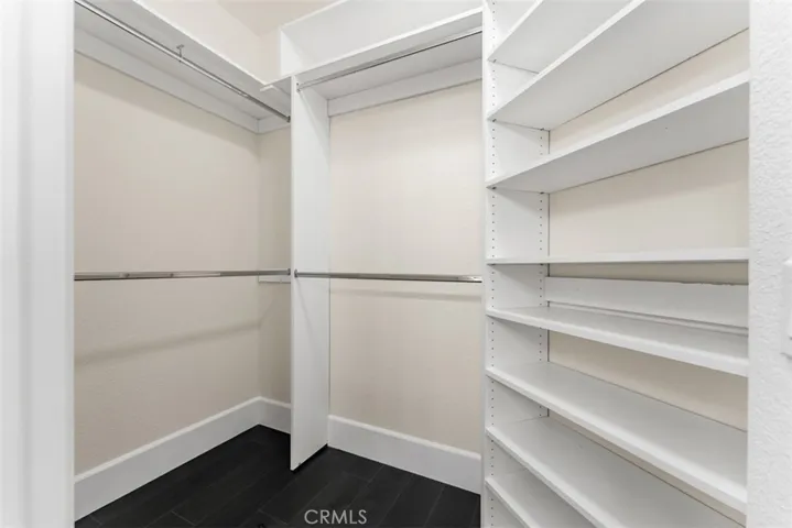 Walk in closet of primary bathroom